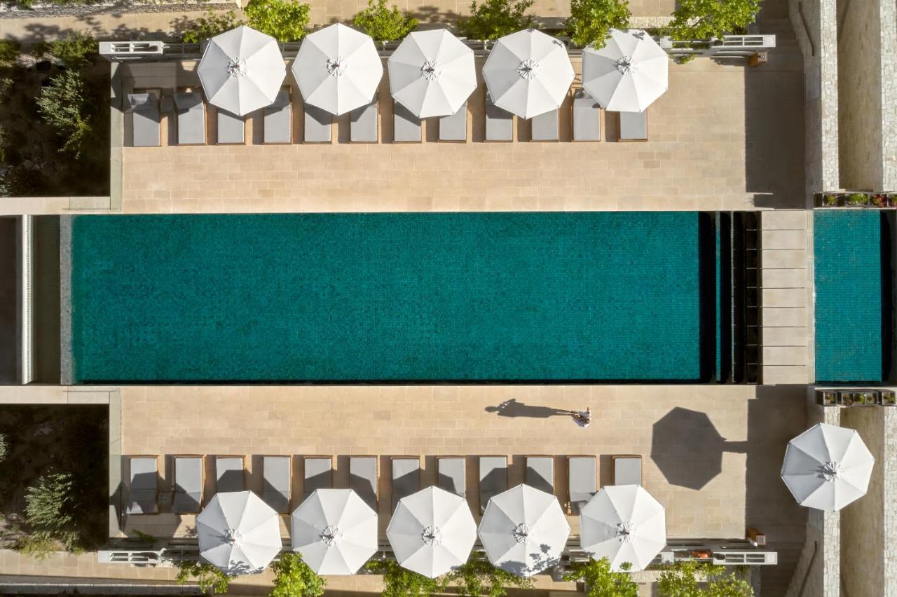 Minthis Resort Tsadha Exterior photo Aerial view of the pool at the Hotel